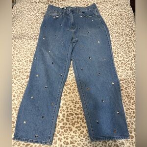 Vintage thread jeans with flowers stitched on them!